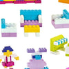 A collection of colorful building blocks and structures including a pink figure and various block arrangements.