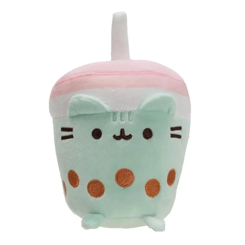 A soft pastel pink and mint green plush cat toy with large eyes and rounded ears.