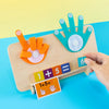 A wooden finger counting math toy showing the equation 1+5=? with colorful fingers and numbers on a light wooden board.