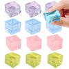 A collection of clear and colored ice cube shaped squishy fidget toys shown from various angles.
