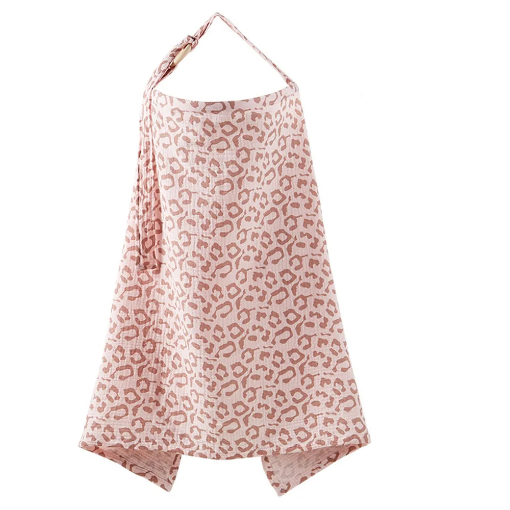 A light pink breathable muslin nursing cover with a leopard print pattern.