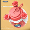 A red and white rocket spacecraft piggy bank with a key lock mechanism.