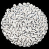 A pile of small white acrylic alphabet letter beads for jewelry making