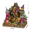 A detailed miniature dollhouse kit of a seaside beach house featuring wooden structures and LED lights.