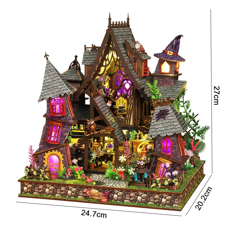A detailed miniature dollhouse kit of a seaside beach house featuring wooden structures and LED lights.