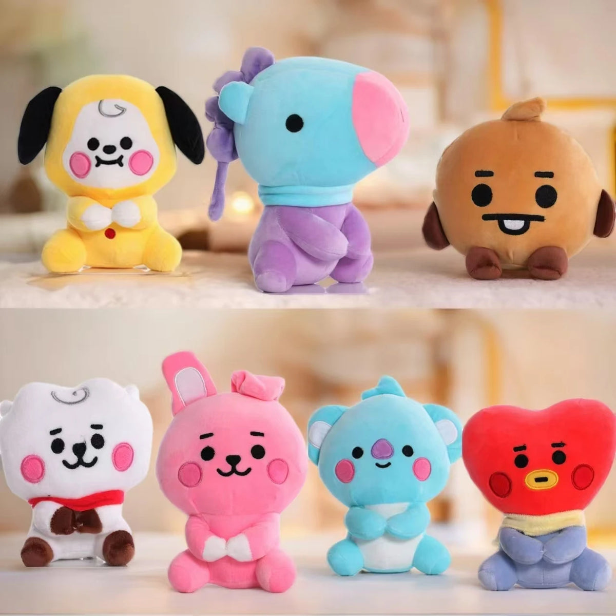 A collection of various cute anime mini plush keychains in pastel colors and soft textures.