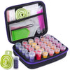 A black Diamond Art storage container with multiple organizer trays and tools for crafting supplies.