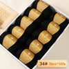 A box of Merino wool yarn balls labeled 34#, containing 10 pieces totaling 500g.