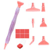 A set of pink resin diamond painting pens with interchangeable metal tips and multi-placers.