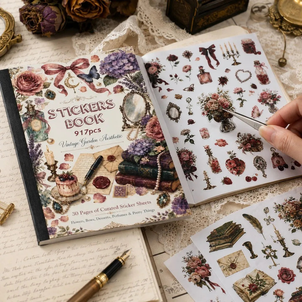 An open sticker book showing floral and botanical elements, including dried flowers, roses, and decorative accents for journa