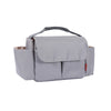 A gray fabric bottle and cup holder designed for strollers.