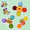 A set of three suction cup spinner bath toys for babies featuring bees and flowers in various colors.