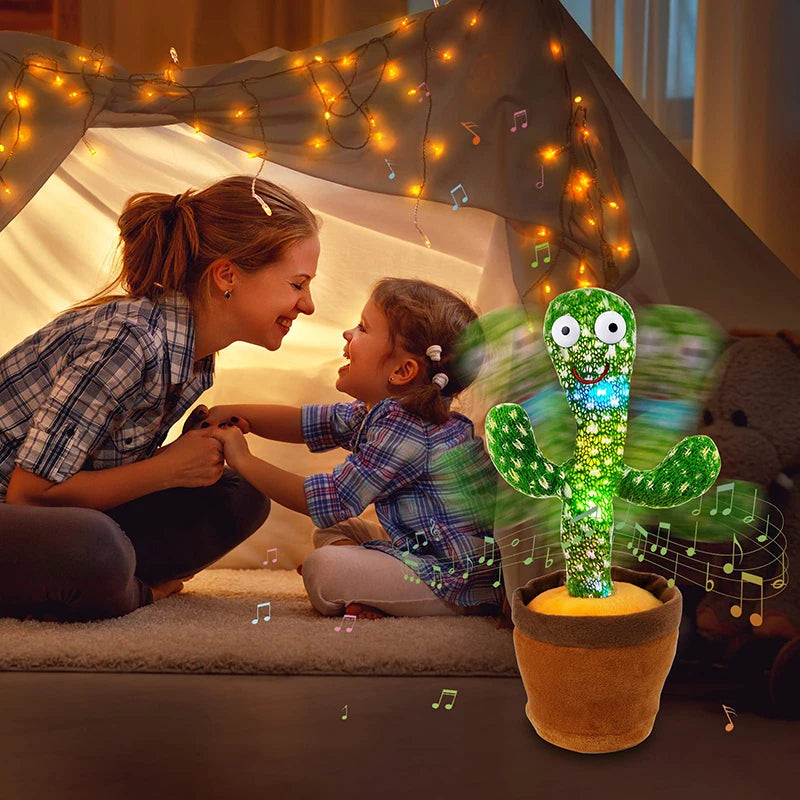 A young girl interacts with an electronic cactus toy that lights up and plays music.