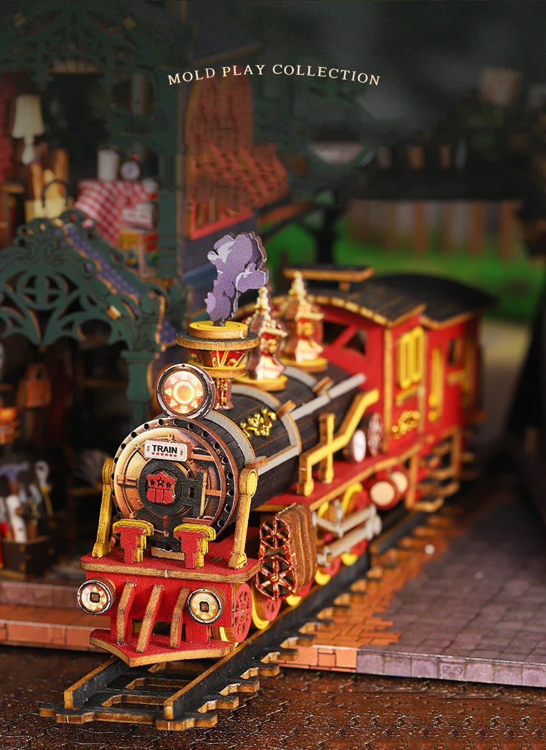 A detailed wooden miniature train locomotive and track set displayed in a diorama setting.