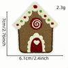 A brown house shaped iron-on patch featuring a swirling red design and a heart window, decorated with green and red accents.