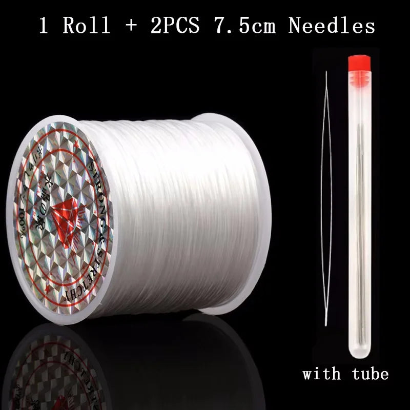 A roll of white elastic beading cord with two 7.5cm needles and a clear tube.