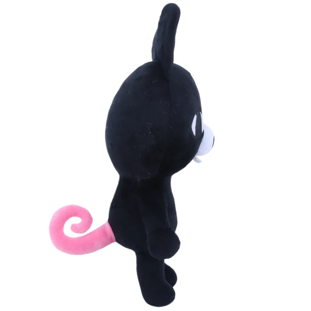A black plush stuffed animal resembling a bunny with a pink tail.