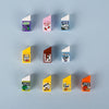 A collection of colorful mini building blocks shaped like food items such as juice, milk, soya, and cheese.