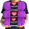Three skeins of purple Super Soft Yarn labeled GOVD YARN for crochet and knitting