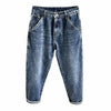 A pair of dark blue vintage loose fit denim harem jeans with front pockets