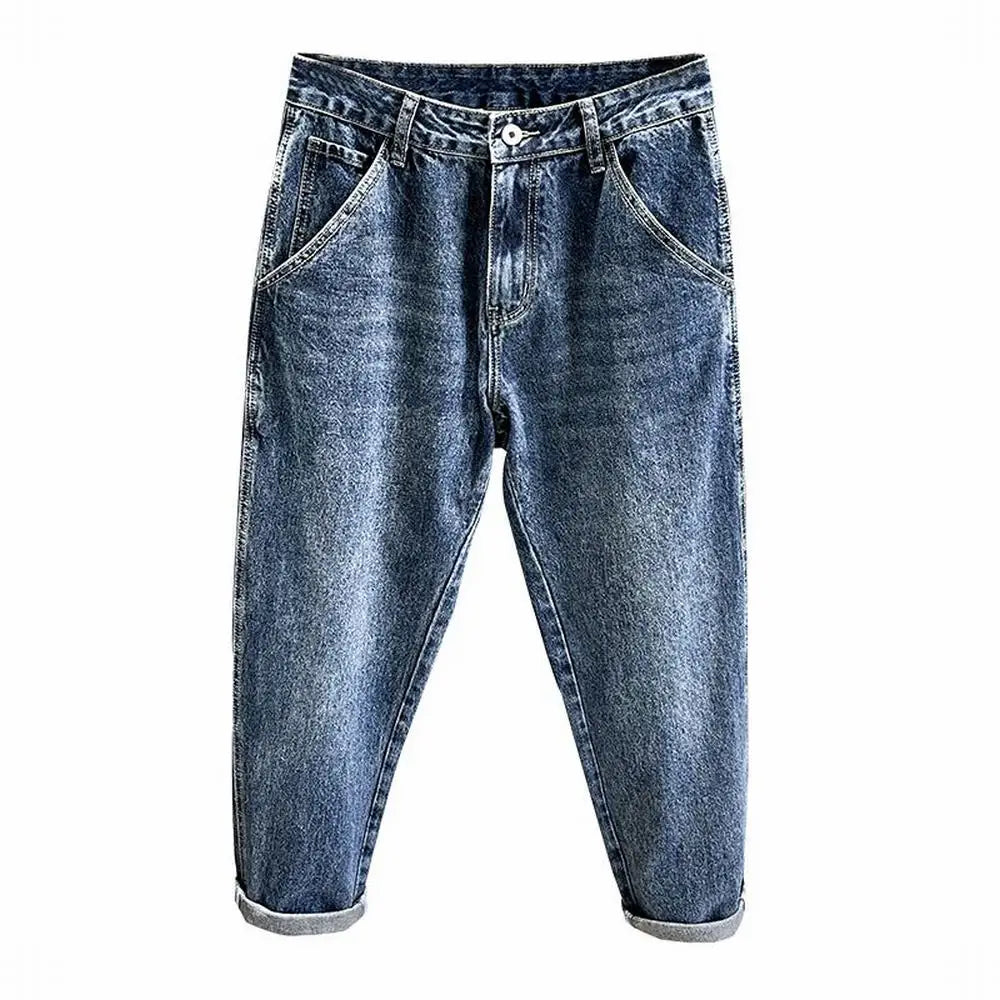 A pair of dark blue vintage loose fit denim harem jeans with front pockets