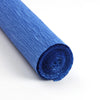 A roll of deep blue crepe paper for DIY crafts and gift wrapping, shown diagonally.