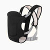 Black all-season multi-position baby carrier sling with padded straps and a storage pocket