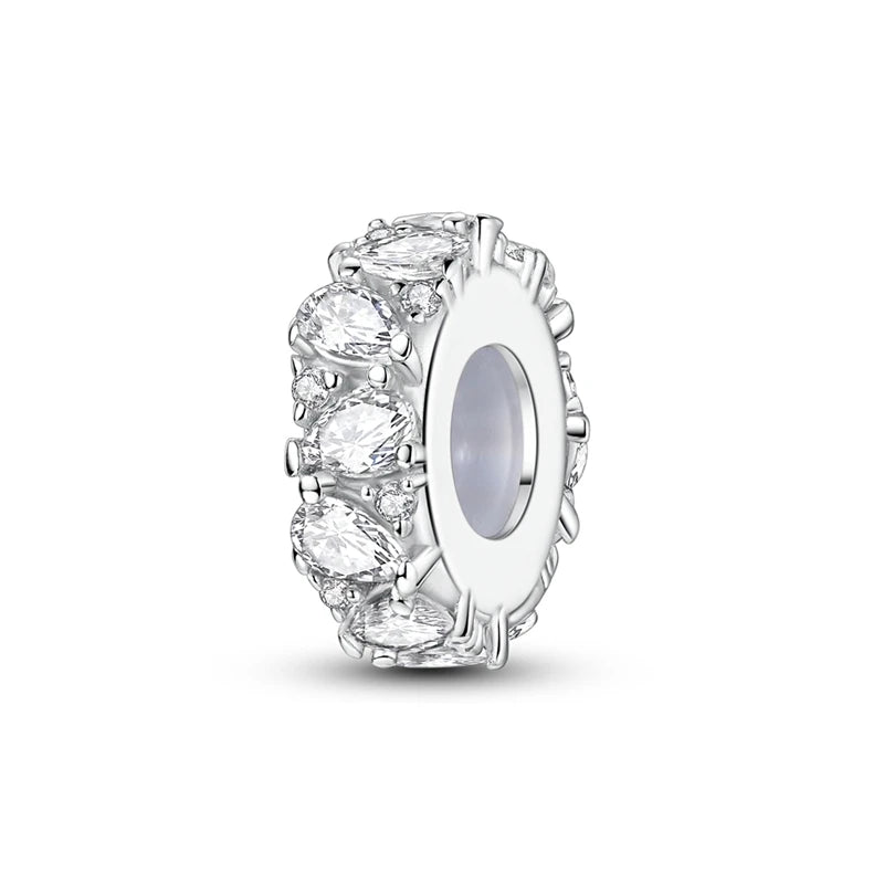 A cluster of brilliant clear diamonds set in sterling silver, designed as charm beads for bracelet making.