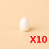 Ten white eggs displayed on a light beige background.
