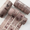 A set of vintage patterned washi tape rolls in muted pink and brown tones for journaling and scrapbooking