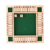 A wooden shut the box dice game board with numbered wooden pieces and two dice inside.