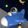 A blue pull-back toy car with a silver cockpit and yellow stars floating in a dark night sky.
