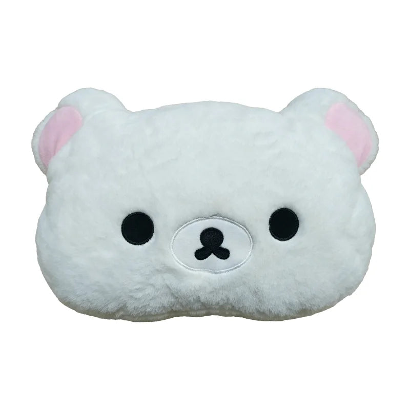A white Rilakkuma soft plush hand rest pillow with pink ears and black facial features.