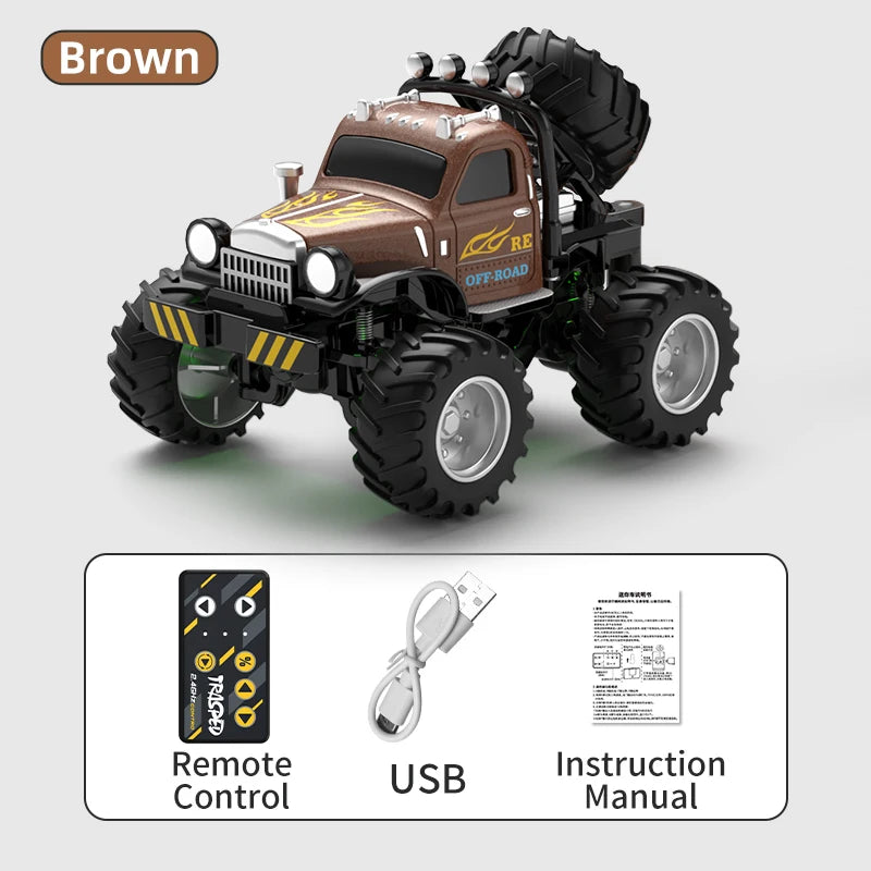 Bra워ner 1:64 RC-Geländewagen mit großen Reifen und Frontscheinwerfer, gezeigt mit Fernsteuerungszubehör.