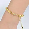 Gold magnetic jewelry clasps for necklaces and bracelets worn on a wrist.