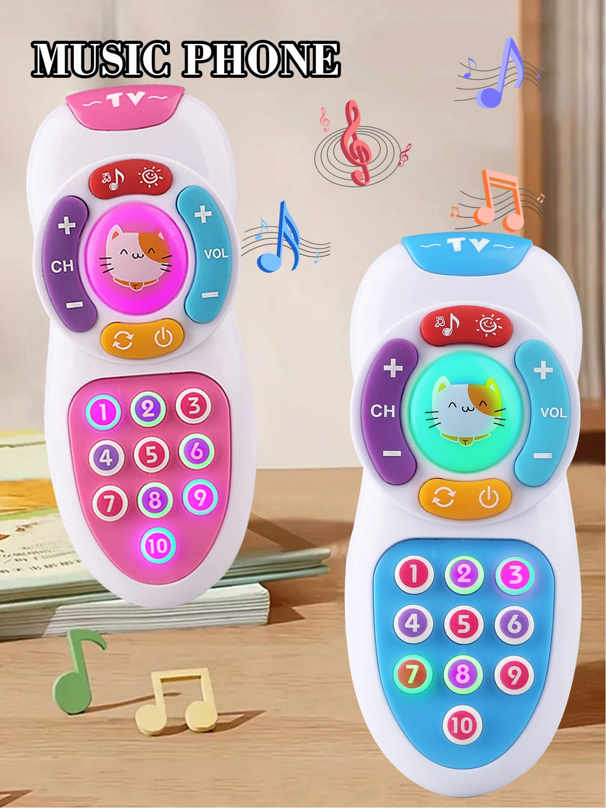 A white music phone toy with colorful buttons, lights, and a cat face, shown next to sheet music.