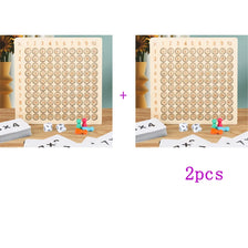 Two wooden multiplication boards for a Montessori game, showing the grid layout and corresponding answer tiles.
