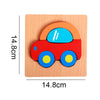 A wooden puzzle shaped like a red car with orange roof and blue windows, used for children's learning.