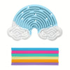 A light blue silicone sensory board with a wavy pattern and a white silicone board, shown next to a stack of colorful silicon