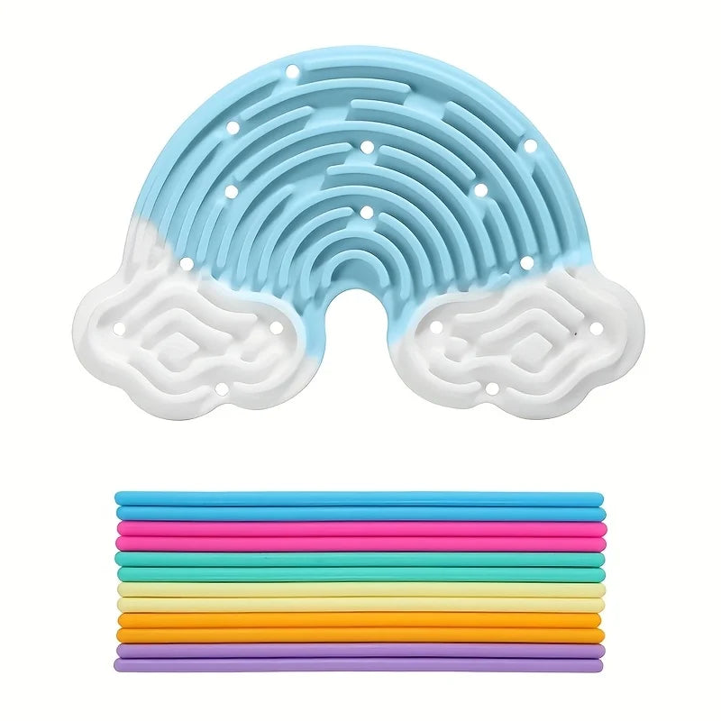 A light blue silicone sensory board with a wavy pattern and a white silicone board, shown next to a stack of colorful silicon