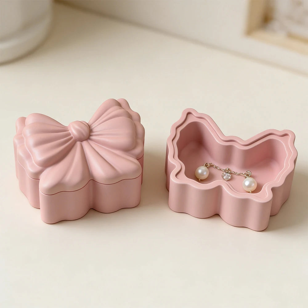 Pink silicone resin mold shaped like a bowknot with a lid for DIY jewelry boxes