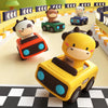 A yellow giraffe push-and-go animal car toy is featured in a race track setting with other animal vehicles.