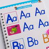 A colorful workbook page showing the alphabet letters Aa and Bb with corresponding pictures like an apple.