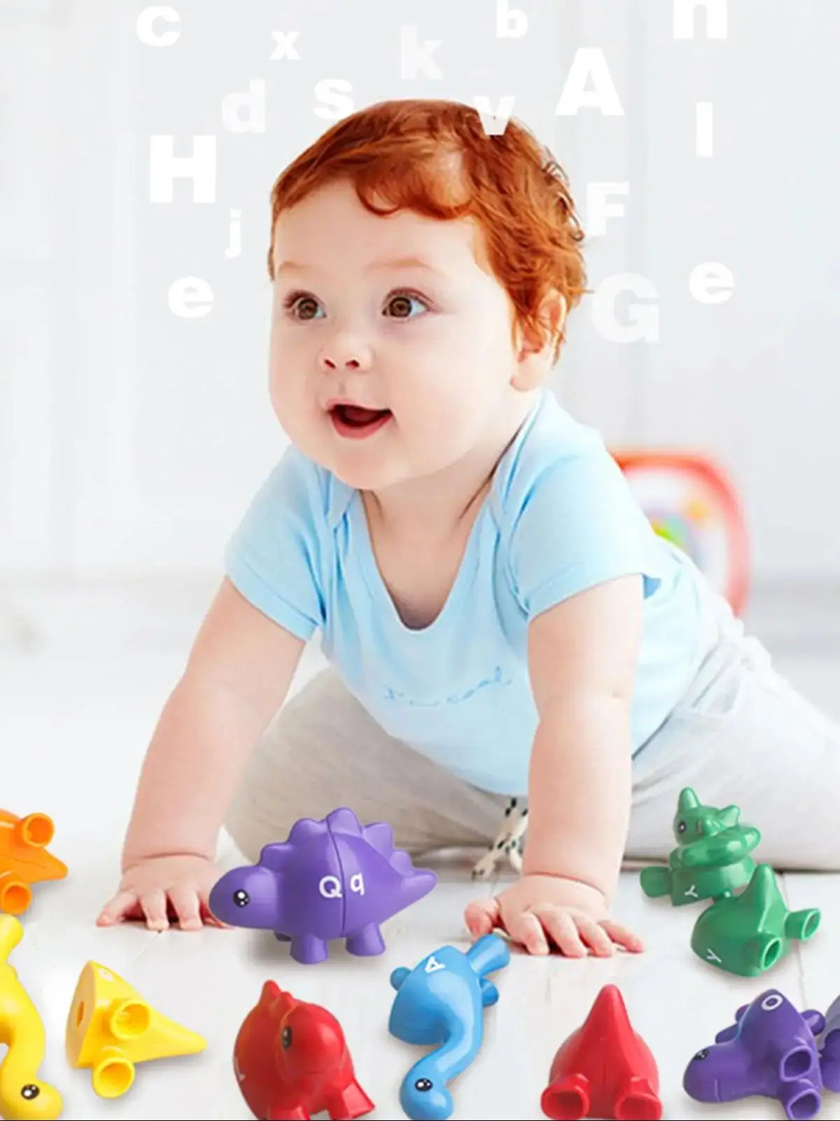 A baby is interacting with a set of 26-piece bilingual alphabet matching letters for literacy development.