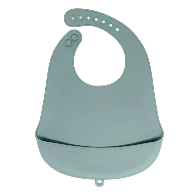 A light blue waterproof silicone baby bib with a catch pocket.