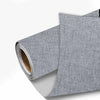 Roll of gray linen book binding cloth used for albums and scrapbooks
