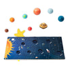 A wooden solar system puzzle board with various planets and celestial bodies for children.