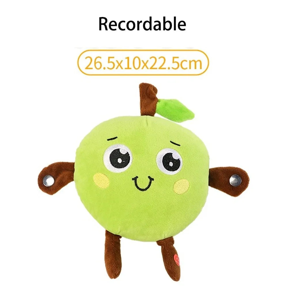 A round, green plush toy shaped like a fruit with brown limbs and a small green leaf.