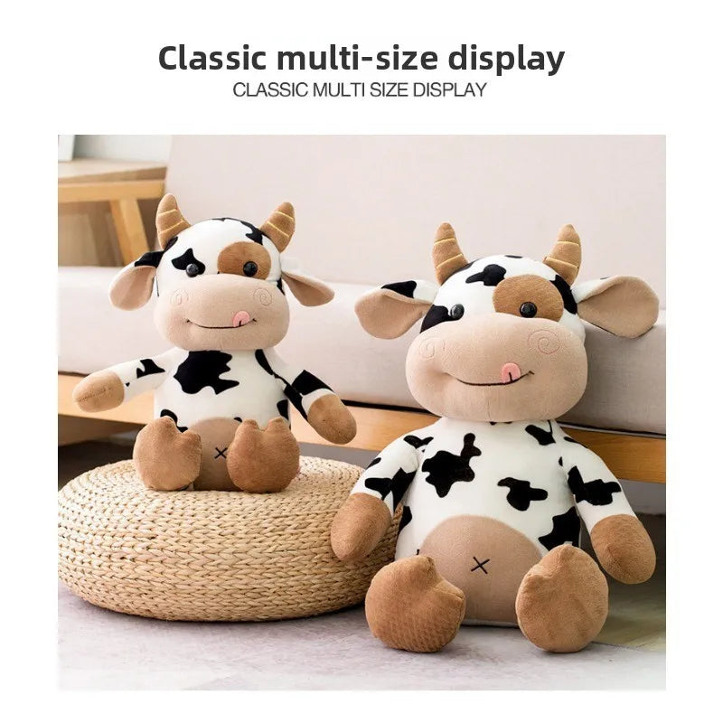 A classic multi-size display of adorable soft cow plush toys in black and white patterns.