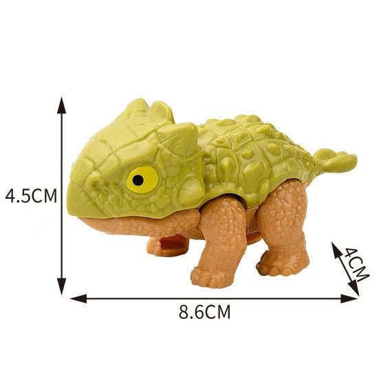 A small, light green finger dinosaur fidget toy with movable joints and a textured skin.